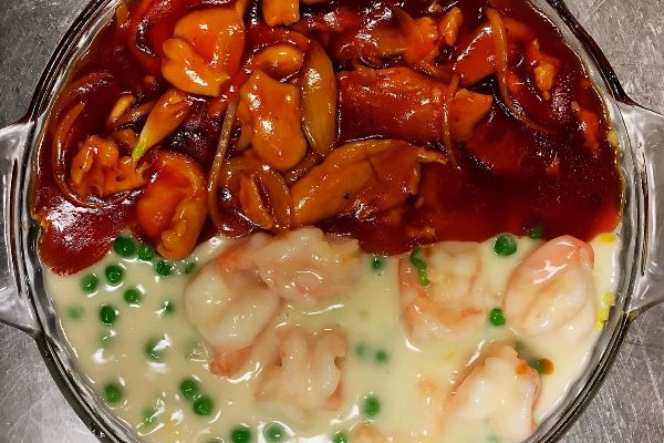 Shrimp & Chicken in Cream & Tomato Sauce on Fried Rice