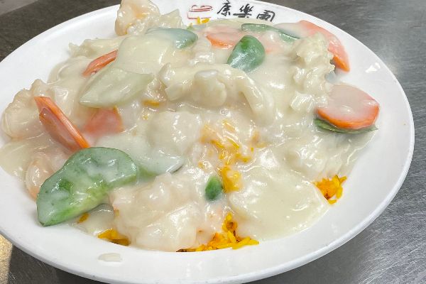 Seafood in Creamy Coconut Sauce on Fried Rice